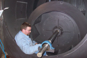 Scott inspecting blower wheel & shaft during a retrofit